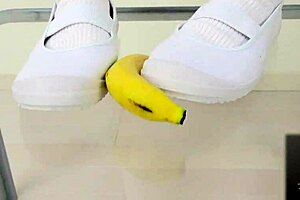 Asian girl's bizarre fetish: crushing food with feet