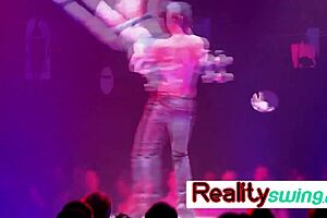 An orgy setting, a night of American swinger couples wild passion together