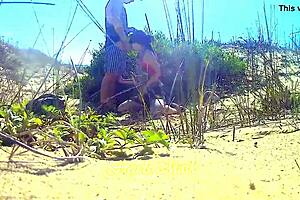 A hot sexy scene on the beach with a nympho nude redheaded teenager eager to swallow your sperm