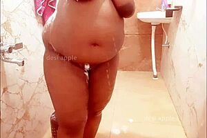 This Bengali wife enjoys bathing and parades around her big assets