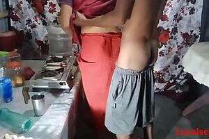 A hot kitchen scene with an innocent Indian housewife and her husband