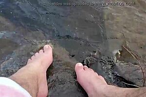 Mikas with sexual appealing fatty figure and big feet takes a bath in the sand