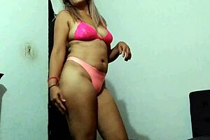 Home made video showing a hot latina blonde in a very erotic scene