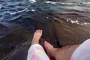 Mikas with sexual appealing fatty figure and big feet takes a bath in the sand