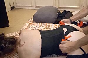 This tells of a skinny white girl clad in only a black corset and satin panties who performs blowjob and movie sex, being f**ed in the ass