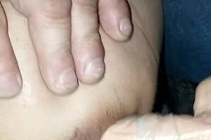 A woman strays a big penis like object into her partner’s vagina