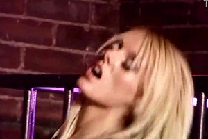 A sexy blonde police officer has some fun with a bad guy in her custody.