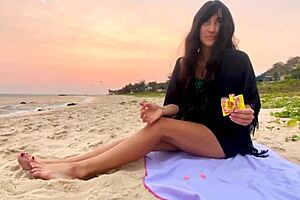 A beautiful girl with beautiful hair enjoys the beauty of nature at sunset.