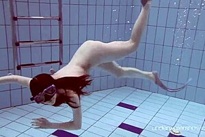 Roxalana Cheh is an underwater slut who wears no bikini.