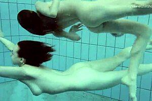 Anna Netrebko and Lada Poeschuk in a hot underwater scene.