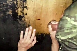Three gay men having sex in a dark room while one of them drinks a milkshake.