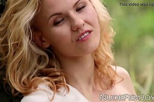 Beautiful woman enjoys sensual pleasure after reading a book
