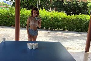 Backstage tour with a beautiful bikini wearing babe playing beer pong and stripping