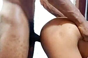 Young African girl gets fucked doggy style in this porn video