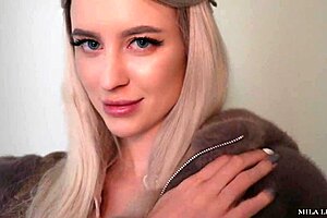 Skinny blonde gets a messy facial in public hallway
