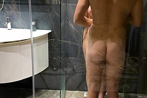 Shower scene turns into a hot and steamy experience with a fan and a creampie