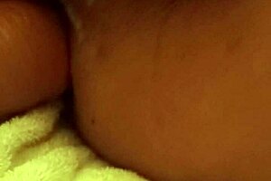 A girl uses a dildo to have sex with a man in the anus