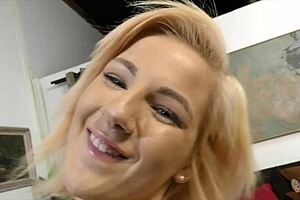 Small booby blonde gets bukkake facial