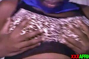 African beauty flaunts her new clothes and her curvaceous behind in a solo performance