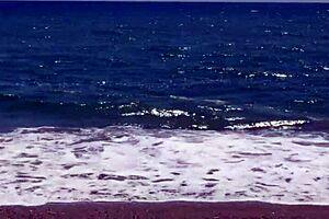 A gay man has sex with a stranger on the beach without the use of a condom