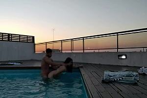 Beautiful big tits and big black cock in hot anal scene at sunset next to the pool