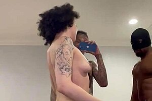 A big black cock orgy with a masked tattooed man and a handjob