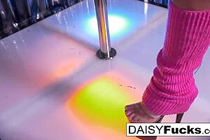 A sexy stripper undresses and masturbates with a pole in the following video