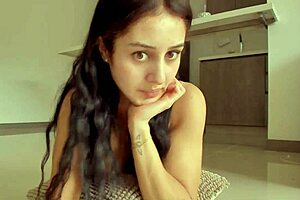 Hot brunette gets down and dirty in live web action