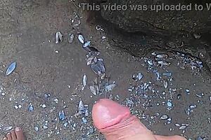 Public beach stone encounter interrupted by a third party