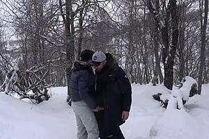 A hot student gives a professor a deep blow job after a ski lesson