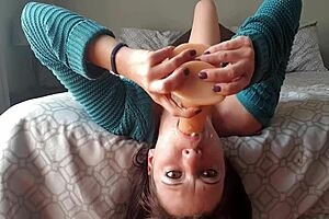 A petite girl gets a deepthroat dildo gag in this homemade porn video