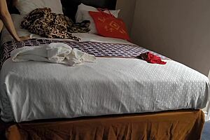 Asian escort in hotel room gives great service