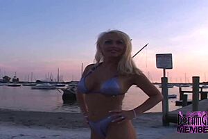 Alanna shows off her big boobs and urinates in public