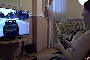 Natural tits bouncing while playing video games
