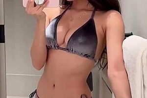 Cover DJ Henney’s hot Asian bikini body with cum