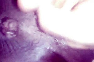 Fingerin' an ebony teen's pussy and it's open wide in this high quality video