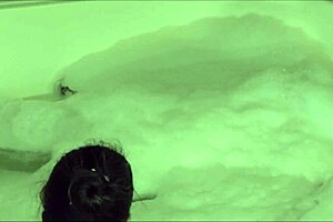 A peek at a young woman blowing bubbles with agarabas and olpr during a massage with a huge natural tits and a jerk off session