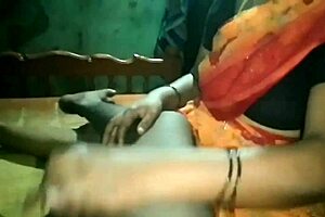 Beautiful aunty gives a good doggy style and a great handjob in the bathroom