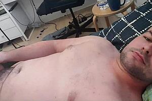 British stud gets covered in cum while he pleases himself