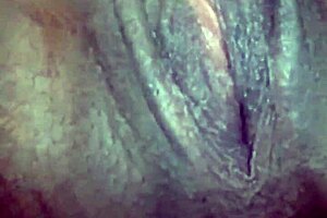 Fingerin' an ebony teen's pussy and it's open wide in this high quality video