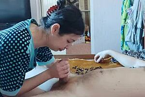 A Korean woman seduces her neighbor and gives him a deep blow job