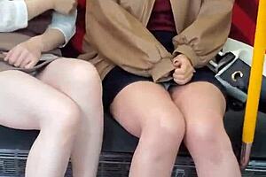 Pretty Asian girls flashing their panties on the train