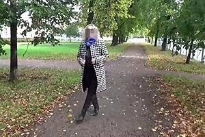 Beautiful blonde MILF in solo performance outdoors