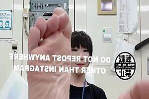 Feet fetish in an Asian office environment