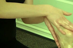 Beautiful young woman gets her first full body massage with oil