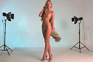 Beautiful blonde teen with hazel eyes strips backstage