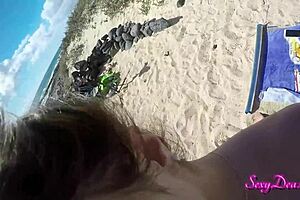 Beautiful woman with an amazing ass enjoys a hot doggy style sex in a beach setting
