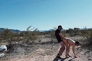 Mya Ryker and her lover having sex in a car in the middle of the desert