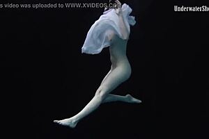 Andrejka performs incredible stunts under the water