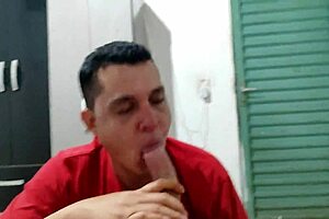 Young gay guy gives blow job to a hung top